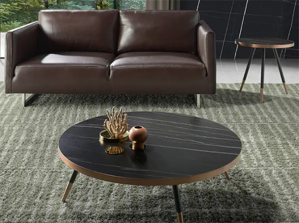 Mesa de rincón redonda en porcelánico negro