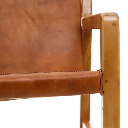 Sillón madera teka y piel de vaca