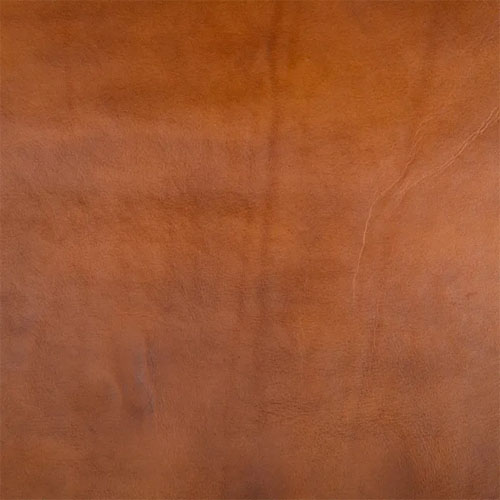 Sillon madera teka natural y piel de vaca