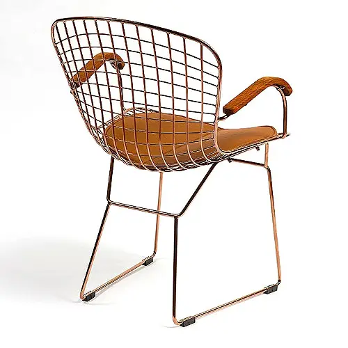 Sillón metal rosado y piel