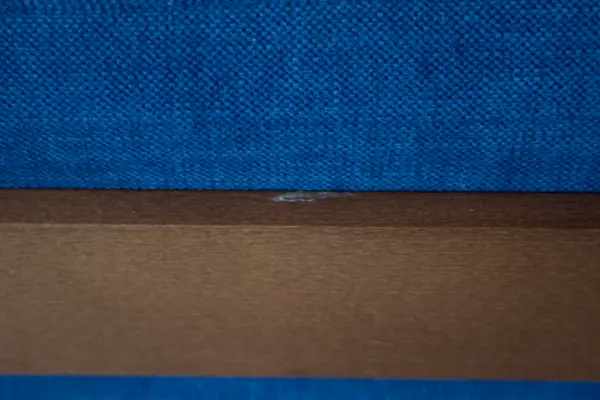 Sofá nogal americano azul Masala de Carmenes lig. defectos