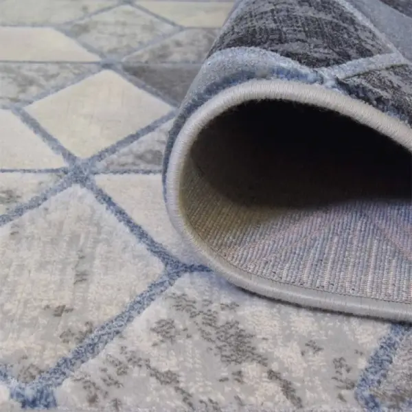 Alfombra geométrica azul Moretti