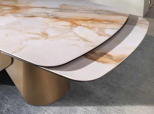 Mesa de comedor extensible ovalada porcelánico y metal Oryxen