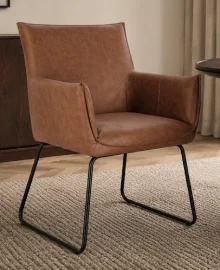 Sillón de acero y tapizado coñac Evelyn