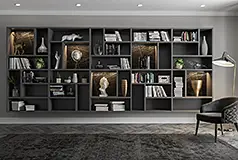 Librería con cubos en porcelánico e iluminación Mondrian